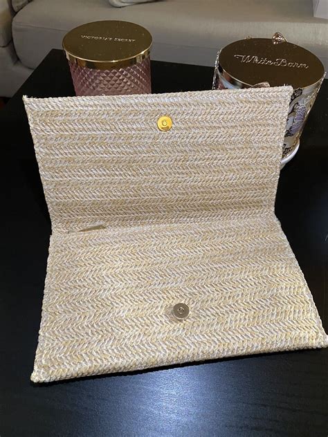 dior raffia makeup pouch